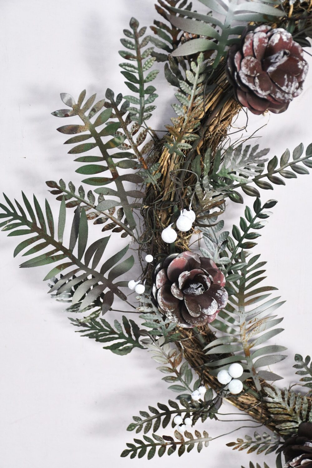 Christmas Artisan Fairtrade Metal Pine Cone and Leaf Wreath Door Decoration - Image 5