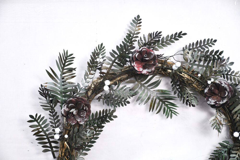 Christmas Artisan Fairtrade Metal Pine Cone and Leaf Wreath Door Decoration - Image 4