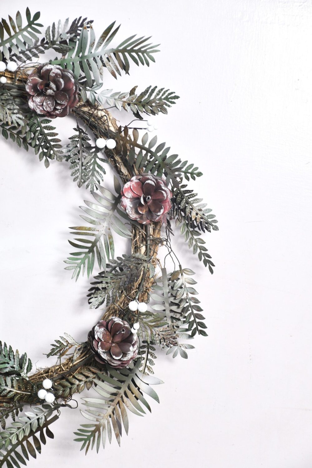 Christmas Artisan Fairtrade Metal Pine Cone and Leaf Wreath Door Decoration - Image 3